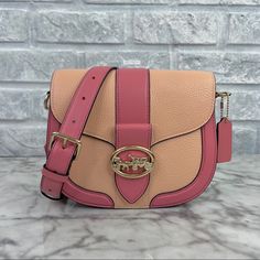 Brand New With The Tag Authentic Color Is Im/Faded Blush/Taffy - A Mauve Pink And Peach Orange Combination Gold Tone Hardware Refined Pebble Leather And Smooth Leather Inside Multifunction Pockets Snap Closure, Fabric Lining Outside Open Pocket Detachable Strap With 20 3/4" Drop For Shoulder Or Crossbody Wear 8 1/4" (L) X 6 3/4" (H) X 2 3/4" (W) Same Or Next Day Shipping! Coach Bag Orange, Retro Pink Shoulder Bag With Adjustable Strap, Pink Retro Shoulder Bag With Adjustable Strap, Chic Pink Saddle Bag For Everyday Use, Retro Pink Shoulder Bag With Detachable Strap, Retro Pink Bag With Removable Pouch, Retro Pink Bag With Detachable Strap, Coach Pink Shoulder Bag With Detachable Strap, Pink Coach Shoulder Bag With Detachable Strap