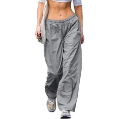 Elevate your fashion sense with these amazing baggy cargo pants and give your personality an enticing vibe. These loose hip-hop pants are elegantly made and are super-stylish as well. Premium materials are used in making and these are quite comfortable and durable as well. These pants are available in different color options, so choose your favorite one. Specifications: Fabric Type: Synthetic Care Instructions: Hand Wash Only Closure Type: Drawstring Rise Style: High Rise About this Item: Materi Baggy Wide Leg Hip Hop Harem Pants, Baggy Wide Leg Harem Pants Hip Hop Style, Wide Leg Parachute Pants For Summer Outdoor Activities, Summer Wide Leg Parachute Pants For Outdoor, Summer Outdoor Wide Leg Parachute Pants, Baggy Cargo Pants For Summer Outdoor Activities, Athleisure Wide-leg Parachute Pants With Pockets, Hip Hop Style Parachute Trousers For Summer, Hip Hop Parachute Trousers For Summer