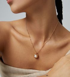 Natural Freshwater Pearl Necklace, Dainty Pearl Pendant Necklace, 18K Gold Plated, Minimalist Necklace, Single Pearl Necklace, Wedding Gift, Perfect for Everyday Wear or Special Occasions. DETAILS ✪ Material: High Quality S925 Sterling Silver, Natural Freshwater Pearl ✪ Finish: 18K Gold Plated Sterling Silver ✪ Length: 40-46cm ✪ Pendant Height: 19mm ✪ Pendant Width: 13mm ✪ Pearl Size: 8mm PACKAGING ✪ All items are nicely packaged ready to gift in elegant jewelry boxes. Our jewelry boxes are reus Luxury Dainty Pearl Necklace With Pearl Pendant, Refined Gold Wedding Jewelry, Refined Wedding Pendant Jewelry, Delicate Pearl White Pendant Jewelry, Refined Wedding Necklace With Pendant, Refined Pendant Necklace For Wedding, Refined Wedding Pendant Necklace, 14k Gold Oval Pendant Necklace For Wedding, White Oval Gold Plated Necklace