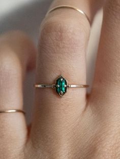 Lucky Green Elixir Ring. This piece will be handmade just for you. Please allow 2-3 weeks of production time before shipping. ✧ 14K Yellow Fine Gold ✧ 4x2mm cultivated green emerald ✧ Pure magic Dainty Emerald Jewelry For Promise, 14k Yellow Gold Emerald Ring For Promise, 14k Gold Emerald Ring For Promise, May Birthstone, 14k Gold Emerald Promise Ring, May Birthstone, Dainty Emerald Open Ring Jewelry, Dainty Gold Emerald Cut Emerald Ring, Promise Emerald Ring In Yellow Gold, Gold Marquise Emerald Ring In 14k Gold, Dainty Emerald Cut Emerald Ring