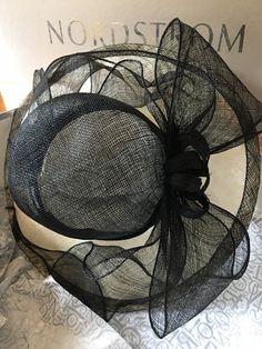 Beautiful black, woven straw hat. Black Short Brim Boater Hat For Church, Black Curved Brim Boater Hat For Church, Black Brimmed Boater Hat For Church, Black Wide Brim Boater Hat For Church, Black Boater Hat With Curved Brim For Church, Black Brimmed Boater Hat For Evening, Black Brimmed Hats For Church, Black Brimmed Church Hat, Black Curved Brim Hat For Church