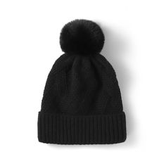 Introducing our Ladies Winter Cable Knit Hat with Pom, a classic and stylish accessory that combines warmth and fashion for the colder months. Crafted from 100% Acrylic, this hat offers both comfort and a timeless look to keep you cozy and chic during winter. Black Knitted Beanie For Winter, Cozy Warm Solid Color Bonnet, Warm Solid Color Bonnet For Fall, Winter Knit Bonnet, Warm Black Bonnet For Winter, Classic Black Winter Hat, Winter Knit Bonnet One Size, Winter Cable Knit Beanie, Winter Black Knitted Bonnet