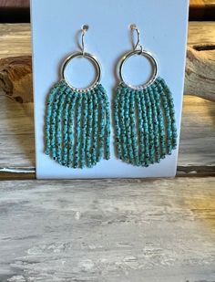 Striking hand-beaded earrings in the long fringe style.  Two pair are inspired by beautiful cities in the Southwest. Two pair are just simple fringe styles. Nickel and lead safe. Turquoise Beaded Fringe Tassel Earrings For Festival, Beaded Fringe Dangle Tassel Earrings For Festival, Turquoise Beaded Fringe Dangle Tassel Earrings, Bohemian Beaded Dangle Earrings With Fringe, Fringe Dangle Chandelier Earrings For Festival, Bohemian Beaded Fringe Dangle Earrings, Turquoise Fringe Beaded Earrings For Festival, Bohemian Turquoise Tassel Earrings With Beaded Fringe, Bohemian Chandelier Earrings With Fringe And Round Beads