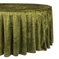 a round table covered in green velvet