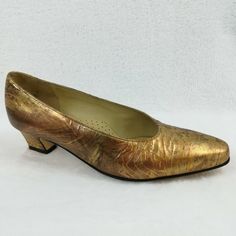 Vintage Johansen Women's Shoes Slipons Low Heel Pumps.  Heel 1.5" Genuine Leather Upper.  Gold Metallic color Made in USA Disclaimer: colors may  slightly vary due to image processing software and monitor calibration. Gently used preowned, normal wear. Small stain insole.  See all photos please as they are part of description. Galas Court Shoes With Round Toe, Classic Gold Court Shoes With Almond Toe, Classic Gold Court Shoes With Round Toe, Fitted Court Shoes With Round Toe For Galas, Classic Gold Heels With Round Toe, Classic Gold Round Toe Heels, Classic Gold Closed-toe Court Shoes, Classic Gold Closed Toe Court Shoes, Classic Closed Toe Gold Court Shoes