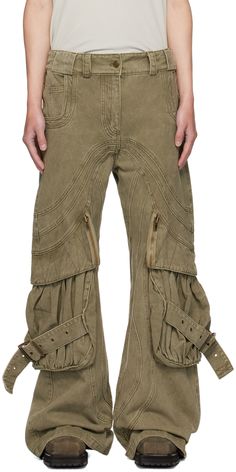 Loose-fit wide-leg non-stretch denim cargo pants. Fading throughout. · Paneled construction · Belt loops · Seven-pocket styling · Zip-fly · Zip pocket at legs · Gathering and pin-buckle strap at bellows pockets · Extended cuffs · Logo embroidered at back waistband · Logo-engraved antiqued gold-tone hardware Supplier color: Green Pockets Fashion Details, Nature Streetwear, No Faith Studios, Cargo Pants Pockets, Steampunk Pants, Dystopian Fashion, Denim Cargo Pants, Green Wave, Studio Green