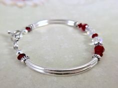 July Birthstone Bracelet: Garnet Birthstone Custom Made | Etsy Adjustable Red Birthstone Bracelet, Adjustable Red Bracelets For Anniversary, Adjustable Red Jewelry For Personalized Gifts, Red Adjustable Jewelry For Personalized Gift, Bracelet Matching, Garnet Birthstone, Red Bracelet, Garnet Red, Handmade Jewelry Tutorials