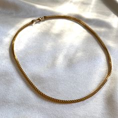 A classic chain with an edge — a square edge to be exact. Worn on its own or layered with others, this is the unique style your dainty collection is longing for. As this necklace is 18K gold plated stainless steel, it has to be looked after for you to enjoy it for a longer period of time. Here are a few tips to help care for your necklace;• Keep away from waterAvoid showering, saunas / steam rooms, swimming, sleeping and exercising in this necklace.• StorageKeep this necklace stored in the origi Everyday Jewelry With Curb Chain Links, Everyday Jewelry With Delicate Square Pendant Chain, Minimalist Rectangular Box Chain Jewelry, Delicate Box Chain Jewelry For Everyday, Everyday Jewelry With Square Pendant Chain, Classic Jewelry With Adjustable Chain And Square Pendant, Timeless Everyday Box Chain Jewelry, Timeless Everyday Snake Chain Jewelry, Everyday 14k Gold Box Chain Necklace