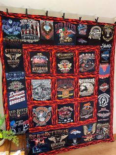 a quilt made to look like a harley davidson patch wall hanging