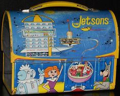 an old lunch box with cartoon characters on it