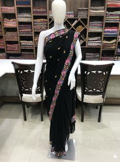 A Marvellous Embroidered Kashmiri Saree which you can wear at any party or a wedding.- - - - - - - - - - - - - - - - - - - - Product Details- Condition: Brand New- Product: Kashmiri Saree - Embroidery: Multi-Colour Papier Mache Hand Embroidery.- Colour: BlackF A B R I CSaree: Viscose GeorgetteBlouse: Indian CrepeF I N I S H- UnstitchedYou can get it stitched locally.- StitchedWant your blouse ready to wear, let us know the style you want and we will stitch it for you.***PLEASE NOTE: We would req Semi-stitched Embroidered Saree Dress With Dupatta, Festive Fitted Saree With Floral Embroidery, Fitted Floral Embroidered Saree For Festive Occasions, Resham Embroidered Dress With Traditional Drape, Chanderi Dress With Embroidered Border For Festivals, Designer Embroidered Dress With Resham Embroidery, Bollywood Style Dress With Embroidered Border And Traditional Drape, Embroidered Anarkali Blouse Piece In Georgette, Traditional Georgette Blouse With Multicolor Embroidery