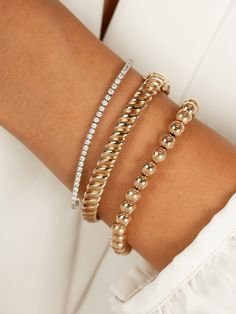 Every woman needs to add some sparkle in her wrist stack. You can't go wrong with any sized Tennis Bracelet. Limited Stock - inquire on availability. These can be made to order in any metal color and diamond size. GH Color, SI Clarity on all of these bracelets. Please email hello@shoplemel.com for custom sizes. Everyday Gold Bracelet, Everyday Stretches, Wrist Stack, Pyrite Bracelet, Wrist Stacks, Bracelet Size Chart, Diamond Tennis Bracelet, Initial Jewelry, Dainty Bracelets