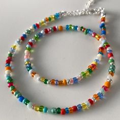 Summer Beach Beaded Necklaces With Spacer Beads, Summer Beach Beaded Necklace With Spacer Beads, Rainbow Beaded Chain For Summer, Adjustable Rainbow Beaded Necklaces For Summer, Rainbow Beads With Beaded Chain For Summer, Summer Rainbow Beaded Chain Beads, Adjustable Multicolor Single Strand Beaded Bracelet, Adjustable Rainbow Single Strand Beads, Adjustable Single Strand Rainbow Beads