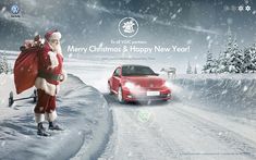 a car driving down a snow covered road next to a santa clause holding a sack