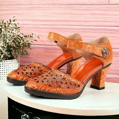 Category:Pumps; Upper Materials:Leather; Lining Materials:100% Leather; Season:Spring,Summer,Fall; Heel Type:Kitten Heel; Gender:Women's; Toe Shape:Round Toe; Style:Vintage,Elegant; Heel Height(inch):1-2; Outsole Materials:Rubber; Occasion:Party,Valentine's Day; Closure Type:Buckle; Pattern:Floral,Cut-out; Listing Date:03/11/2024; 2024 Trends:Mary Jane,Handmade Shoes,Vintage Shoes; Heel Height:Mid Heel Summer Formal Leather Shoes With Round Toe, Brown High Heel Leather Shoes For Spring, Vintage Leather Shoes For Summer, Elegant Summer Party Leather Shoes, Summer Leather Court Shoes For Party, Summer Party Leather Shoes, Leather Court Shoes For Summer Parties, Summer Court Shoes With Heel Strap And Round Toe, Summer Round Toe Court Shoes With Heel Strap