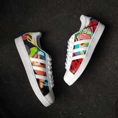 Take your style to the next level with our Graffiti Colorful Black Green Red Blue Custom Adidas shoes! Stand out from the crowd with the bold colors and customizable design. Express your bold and adventurous side with every step. Dare to be different with these unique shoes. Exactly as shown in the pictures. 📷 Brand New & Authentic. 💯 Hand Painted with attention to detail. 👨‍🎨 Waterproof and Flexible. ❤️ Unisex model. Please refer to the Size Chart. 👟👫 Free Worldwide Shipping. ✈️🌍 Hand Painted Red Custom Sneakers For Streetwear, Red Hand Painted Custom Sneakers For Streetwear, Multicolor Urban Custom Sneakers With Boost Midsole, Urban Style Multicolor Custom Sneakers With Boost Midsole, Urban Multicolor Custom Sneakers With Boost Midsole, Urban Style Multicolor Custom Sneakers For Sports, Custom Red Hand Painted Sneakers For Streetwear, Multicolor Hand Painted Low-top Custom Sneakers, Hand Painted Multicolor Low-top Custom Sneakers