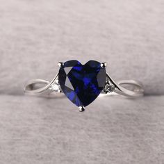 ◆ The ring is handcrafted from sterling silver and decorated with a dazzling 8*8 mm sapphire and CZs. It is suitable for engagement/anniversary/daily occasion. ◆ Production Description: Main stone Type: Lab Sapphire Main Stone Shape: Heart Cut Main Stone Size: 8*8 mm(2.6ct) Side stone: CZ Metal: 925 Sterling silver - Other options available in the drop down menu ◆ Customization: √Free for Add Engraving √Other Metal Type Available √Other Gemstones & Shapes Available √Personalization Requests Avai Heart Shaped Sapphire Ring, Fine Jewelry Sapphire Heart Cut Ring, Heart-shaped Sapphire Jewelry For Wedding, Heart Cut Sapphire Ring In Fine Jewelry Style, Promise Sapphire Diamond Ring, Heart Cut Sapphire Ring Fine Jewelry, Gift Sapphire Ring With Diamond Accents, Sapphire Ring With Diamond Accents Gift, Elegant Blue Heart Cut Sapphire Ring