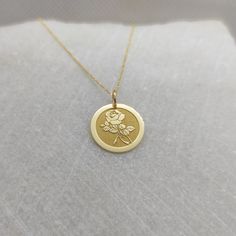 "14K Real Solid Gold Necklace, Hallmarked on the back of your pendant for certification! Rose Flower Necklace - Engraved Rose Charm - Gold Graduation Charm - Gold Rose Flower Pendant ▪️ A beautiful and clean engraved Rose Flower pendant made out of 14K Solid Real Gold. Available only in yellow gold! Pendant Thickness: 0.50mm Jump Ring inner diameter: 4mm Dimensions - Small - 13x13mm / 0.51 x 0.51 inches Medium - 14x14mm / 0.55 x 0.55 inches Big - 15x15mm / 0.59 x 0.59 inches Necklace Length - Yo Rose Pendant Jewelry With Flower Charm, Rose Pendant Jewelry With Rose Design, Rose Jewelry With Flower Charm And Pendant, Rose Flower Charm Pendant Jewelry, Gold Necklaces With Rose Flower Pendant, Gold Flower Pendant Jewelry With Roses, Gold Necklace With Rose Flower Pendant, Gold Rose Design Pendant Jewelry, Gold Rose Pendant Jewelry