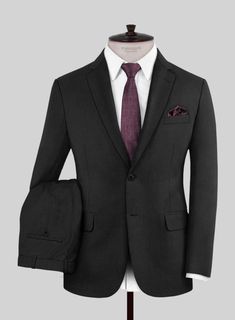 Acclaim your ensemble with the subtle gleam of the Hardy Minnis Caravel Black Wool Suit. Meticulously tailored from sumptuous wool, its black shade exudes an aura of versatility, where each stitch speaks to the mastery of its artisans, ensuring a flawless fit that accentuates the wearer's contours with effortless grace. Whether adorning a prestigious gala or presiding over the boardroom with regal elegance, this suit epitomizes understated courtliness. 
  The "Enterprise" collection by Hardy Min Italian Suit, Wool Suit, Black Button, Black Suits, Double Breasted Suit, Jacket Buttons, Black Wool, Shades Of Black, Jacket Style