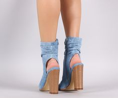 These chic booties features a slouchy shaft with cutout design back and squared open toe silhouette. Finished on a chunky stacked heel and side zipper closure. Material: Denim (man-made) Sole: Synthetic Measurement Heel Height: 4.5″ (approx) Shaft Length: 9″ (including heel) Top Opening Circumference: 10″ (approx.) Spring Fitted Booties With Block Heel, Heeled Boots With Stacked Block Heel For Spring, Spring Heeled Boots With Stacked Block Heel, Casual Heeled Boots With Stacked Heel For Spring, Casual Spring Heeled Boots With Stacked Heel, Spring Heeled Boots With Stacked Heel, Chic Spring Booties With Square Toe, Spring Chic Square Toe Booties, Chic Spring Booties With Stacked Heel