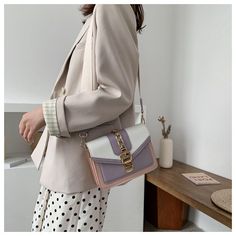 Ilaria Bag Material: PU, Polyester Colors available: Black, Purple, Green, White Size: Length 20cm, width 7cm, 15cm high Note: 1 Inch=2.54 CM; 1 CM=0.39 Inch , Due to different batches, the bag's liner may be different We pay your attention on the fact that different computer screens can display different colors even though this is one and the same color. Therefore color of the received good can be a little bit different than the good on the photo. Purple Shoulder Bag For Office, Trendy White Shoulder Bag With Hasp Closure, Modern Purple Rectangular Satchel, Modern Rectangular Purple Satchel, White Rectangular Baguette Bag For Errands, Chic Purple Shoulder Bag For Mobile Phone, Purple Satchel Shoulder Bag For Office, White Rectangular Flap Bag For Mobile Phone, Chic Purple Shoulder Bag With Mobile Phone Pocket