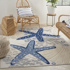 a living room with a starfish rug on the floor