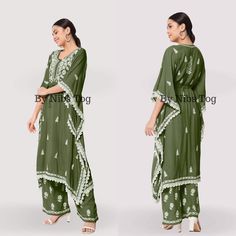 Nibs Tog Ryon Cotton Lucknowi Chikankari Kaftan Dress for Women Green Beautifully crafted with different motifs of Chikankari, well finished with lace work, Presenting you this beautiful Chikankari Kaftan Dress Set with Bottom. Made of Soft ryon Cotton fabric. Check full details below. Shop More Chikankari outfits by Nibs Tog on our Shop : https://www.etsy.com/in-en/shop/NibsTog Fabric: The Kaftan is made of soft Ryon Cotton and it is not transparent fabric. Style: The outfit is style in Kaftan Look with a waist string to adjust. The Set includes one Kaftan and Straight Palazzo Pant with Chikankari Embroidery. Occasion: The Chikankari Kaftan Dress can be styles for any casual day, at home for your comfort or you can carry the Kaftan for Beach Cover Up, It can be Kaftan for Resort Wear and Green Kaftan For Wedding And Navratri, Traditional Summer Kaftan With Dupatta, Traditional Summer Tunic With Dupatta, Green Bohemian Palazzo Set For Navratri, Green Bollywood Kaftan With Dabka Work, Bohemian Green Palazzo Set For Festivals, Embroidered Anarkali Tunic Palazzo Set, Anarkali Embroidered Palazzo Set With Tunic, Unstitched Floor-length Kaftan For Eid