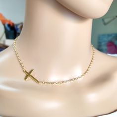 Cross gold steel necklace, Layering jewelry, Religion cross choker, Gold necklace, Minimalist jewelry, Dainty cross choker, Tiny necklace Beautiful simple necklace with gold stainless steel cross and steel chain. Simple choker or everyday wear Length 42cm  The necklace will be delivered inside a craft jewelry box. JEWELRY CARE: Please take care of your jewelry do not wear in the shower, swimming pool, or to bed. Keep away from harsh chemicals and cleaners. It is always best to put on your jewelry on after applying lotions, hair sprays and make-up. Remember to always remove your jewelry before doing any activity that could cause damage to your jewelry. more necklaces https://www.etsy.com/shop/artncreate?ref=seller-platform-mcnav§ion_id=14284001 Thanks for visiting! Minimalist Clavicle Chain Crucifix Jewelry, Minimalist Crucifix Jewelry With Delicate Chain, Minimalist Crucifix Clavicle Chain Jewelry, Gold Crucifix Charm Necklace In Minimalist Style, Minimalist Cross Charm Necklace With Delicate Chain, Gold Minimalist Crucifix Charm Necklace, Minimalist Gold Crucifix Charm Necklace, Minimalist Clavicle Cross Chain Jewelry, Minimalist Crucifix Jewelry With Adjustable Chain