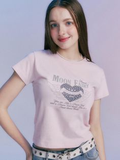 This is a casual and trendy top by MOONFAIRY that is made out of high quality and sturdy material. With distinctive mood of the design and comfortable wear, you can style it for your casual daily outfit.- Unique graphic artwork detail- Soft and sturdy cotton 100% fabric- Young and feminine mood Trendy Pink T-shirt With Heart Print, Pink Heart Graphic Short Sleeve T-shirt, Trendy Cotton T-shirt With Heart Print, Pink Heart Print T-shirt For Spring, Pink Heart Print T-shirt For Summer, Pink Heart Graphic T-shirt For Streetwear, Pink Y2k Short Sleeve T-shirt, Pink Y2k Style Short Sleeve T-shirt, Trendy Heart Print T-shirt For Spring