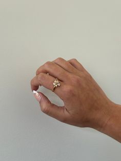 Flower ring - This adjustable dainty flower ring is incredibly stunning. Made to sparkle and shine on any finger! A perfect gift for women, girlfriend, best friends, sisters, moms. A perfect option for those who like minimal dainty gold rings and want to have the perfect size. - gold filled- stainless steel and gold- cz stones- Style: Minimalist Delicate Flower Ring For Spring Gift, Delicate Spring Flower Ring Gift, Dainty Jewelry For Spring Anniversary, Dainty Jewelry For Anniversary In Spring, Dainty Spring Jewelry For Anniversary, Delicate Flower Charm Ring For Gift, Delicate Flower Charm Ring As Gift, Delicate Open Crystal Ring For Promise, Flower Shaped Wedding Rings For Spring