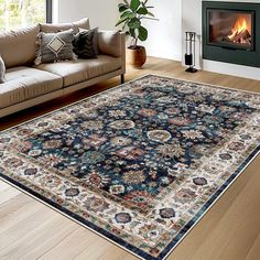 a living room filled with furniture and a large rug on the floor next to a fire place