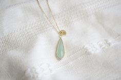 Complete your evening looks with this exquisite Natural Jade Drop Necklace. Handcrafted from lustrous jade, this elegant piece features an eye-catching drop design for a truly glamorous look. Redefine your style with an enduring piece of natural beauty and artistry. Feel the elegance and unique style of this timeless jewelry. • How To Order 1. Choose the size. 2. Select initials, if you do not want any initial, select "NONE"(UPPER CASE and HEART Shape Available) 3. Add to cart and submit order : Elegant Jade Necklaces As Gifts, Elegant Jade Necklaces For Gifts, Elegant Jade Necklace For Gifting, Elegant Jade Necklace As Gift, Elegant Jade Necklace For Formal Occasions, Elegant Jade Gemstone Necklaces, Elegant Jade Necklace With Gemstone, Elegant Jade Necklace For Wedding, Elegant Jade Necklace Round Shape