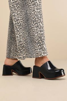 Let everyone know your style is one to watch with the Melissa Mia Black and Brown Platform Mules! Sleek, seamless rubber shapes these instantly iconic mules that have an almond-shaped toe and a flexible, clog-inspired upper. 1.25"" toe platform and chunky block heel boast a cool, brown-toned border to complete the look. Easy, slide-on design. Available in whole sizes only. 3. 5" block heel. Cushioned insole. Rubber sole has nonskid markings. Man Made Materials. Imported. Lulus | Mia Black and Br Chunky Mules Outfit, Mules Outfit, Platform Shoe, Platform Mules, Almond Shaped, Chunky Block Heels, Fashion Baby, Fall Shoes, Platform Shoes