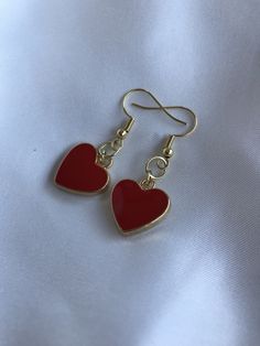 "FIRST TIME DISCOUNT: USE CODE FIRSTTIME20 FOR 20% YOUR FIRST ORDER! ♡ ALL PACKAGING IS 100% RECYCLABLE, BIODEGRADABLE, OR MADE FROM 100% RECYCLABLE MATERIALS ♡ These super cute gold heart dangling earrings are a perfect accessory to your already gorgeous ears! ALL ORDERS NOW COME WITH A GIFT BOX! Listing comes with two earrings (aka: one pair)! Dimensions: heart: 17mm entire earring: around 1.5\" (one and a half inches) long Materials: hook: 14kt Gold Plated 14kt Gold Filled ALL PACKAGING IS 10 Heart Shaped Earrings For Valentine's Day Gift, Heart Detail Double Heart Earrings For Gift, Gift Double Heart Detail Earrings, Double Heart Earrings With Heart Print, Valentine's Day Heart Earrings For Pierced Ears, Valentine's Day Gift: Heart Earrings For Pierced Ears, Valentine's Day Heart Earrings Gift, Valentine's Day Heart-shaped Earrings Gift, Valentine's Day Double Heart Earrings With Heart Beads