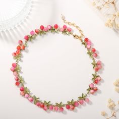 This Pinkberry Necklace is a timeless and elegant accessory made from natural stone and featuring a beautiful green leaf amidst an ethereal spring. An exquisite piece that will bring sophisticated luxury and unparalleled style to any outfit. DETAILS Plating: 18K Gold Materials: 18K Gold on Brass, Natural Stone Measurements: Length: 13.39"(34cm) + Extender: 3.54"(9cm) Weight: 30.31 g The customized service requires an additional payment, such as extended the necklace. Elegant Flower-shaped Jewelry With Colorful Beads, Elegant Spring Jewelry With Colorful Beads, Elegant Colorful Beads Jewelry For Spring, Elegant Flower-shaped Colorful Beads Jewelry, Delicate Green Jewelry For Spring, Elegant Green Necklace For Spring, Elegant Flower Necklace With Colorful Beads, Elegant Flower-shaped Beaded Necklaces With Colorful Beads, Elegant Flower Shaped Beaded Necklace With Colorful Beads