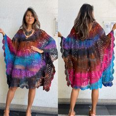 Handmade crochet tie dye kaftan dress. 100% cotton. Multiple color. One size fit most figure. Model 5'6 Measurements: Bust and hip 63 inches around. Length 34.5 inches V neck deep 9 inches. CARE: Machine cold in a washing bag. Multicolor Free Size Boho Tunic Dress, Multicolor Long Boho Dress For Beach, Bohemian Multicolor Dress, Hippie Multicolor Free Size Kaftan, Hippie Style Multicolor Boho Dress For Beach, Multicolor Bohemian Beach Dress For Festival, Multicolor Hippie Boho Dress For Beach, Multicolor Hippie Boho Dress For Festival, Multicolor Tunic Boho Hippie Dress