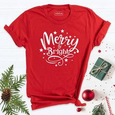 Merry and Bright Shirt, Christmas Shirt, Merry Shirt, Noel Christmas Day T-Shirt, Christmas T-Shirt, Christmas Tee Shirt, Christmas Tshirt. Hi! Welcome to our store. It's good to see you here. Our aim is to offer you first-class clothing in your most beautiful moments with our graphic t-shirts that we designed or designed with your ideas. I am sure you will like our designs for your family, friends and you. IMPORTANT MATTERS FOR ORDERING: 1-) Please check and review all photos. 2-) Our sizes are New Year Holiday Crew Neck T-shirt, Christmas Cotton T-shirt, Christmas Cotton T-shirt Gift, Red Holiday Shirt For Gift, Red Holiday Shirt Gift, Holiday Red Shirt As Gift, Red Graphic Print T-shirt For New Year, Red Holiday Crew Neck T-shirt, Holiday Red Crew Neck T-shirt