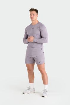 Introducing the long sleeve rendition of our Micro Mesh Tee - a fusion of style and functionality for those who demand peak performance from their gym-wear. Crafted to enhance your physique, this long sleeve gym tee boasts raglan sleeves, along with curved front and back hems, ensuring a fit that moves with you seamlessly from the gym to the streets. Engineered with our signature Micro Mesh DNA™, it not only enhances breathability and moisture-wicking but also embodies a modern aesthetic. Tlf Apparel, Motion Logo, Gym Tees, Mesh Long Sleeve, Jacquard Knit, Peak Performance, Modern Aesthetic, Athletic Fits, Boyfriend Fit