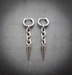 Stunning silver spike and chain link earrings! Unisex. Sold as a pair  Made of high quality stainless steel. Spike measures 21mm hoops measure 15mm  Please don't hesitate to contact me with any queries or suggestions 😊  Comes gift wrapped 💜 Minimalist Silver Metal Piercings, Modern Silver Metal Piercings, Edgy Silver Metal Plug Earrings, Hypoallergenic Silver Metal Piercings, Nickel Free Minimalist Metal Piercings, Tarnish Resistant Metal Dangle Cartilage Earrings, Nickel-free Minimalist Metal Piercings, Silver Stainless Steel Dangle Cartilage Earrings, Minimalist Nickel-free Metal Piercings