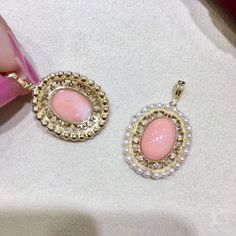 Highlight: Beautiful Color Natural Momo Coral Product Information OriginJapan MaterialAkoya Pearl, 18k Gold, Natural Coral, and Diamond Dimensions3.5 x 2.0 cm Pearl Shaped: Round Size: 2-3 mm Quality: AAA Nacre: Very Thick Color: White Luster: Very High Accessories Metal: 3.4g of 18k Gold Other: Natural Momo Coral, and 0.09ct of SI Quality Natural Diamond Exclude Chain Tahitian Pearl Pendant, Pearl Chandelier Earrings, Pearl Chandelier, Akoya Pearl Earrings, Golden South Sea Pearls, Tahitian Black Pearls, Natural Coral, Sea Pearls, South Sea Pearls