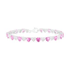 Enjoy the vibrant color of this heart fashion bracelet. Created in sterling silver, this design features 5.0mm heart-shaped lab-created bright pink sapphires alternating with shimmering lab-created white sapphire clusters within polished heart-shaped frames. Buffed to a brilliant luster, this 7.25-inch link bracelet secures with a lobster claw clasp. White Gold Heart Cut Bracelet, Pink Heart Bracelet For Valentine's Day Anniversary, Pink Heart Charm Bracelet For Anniversary, Heart-shaped Sterling Silver Bracelets, Sterling Silver Heart Bracelets Fine Jewelry, Sterling Silver Heart Bracelet Fine Jewelry, Sterling Silver Heart-shaped Fine Bracelets, White Gold Sterling Silver Heart Bracelet, White Gold Heart Cut Bracelet For Valentine's Day