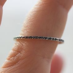 This unique stacking ring is a fascinating addition to your stacking set. You will adore its minimalist style and simple beauty. Wear it alone or stacked with others - it will become your favourite piece anyway! The ring is made of sterling silver. It is 1 mm thick. You may order the ring of any size. If you are not sure about the size, this will be helpful: findmyringsize.com/ If you want to buy the ring as a gift and you don't know the precise size, you may also choose a standard size: Small ( Minimalist Hammered Silver Stackable Rings, Minimalist Sterling Silver Bands For Everyday, Minimalist Sterling Silver Stackable Rings For Promise, Everyday Sterling Silver Stackable Midi Rings, Everyday Stackable White Gold Engraved Ring, Minimalist Engraved Stackable Toe Ring, Minimalist Stackable Engraved Toe Ring, Everyday Stackable Engraved White Gold Ring, Minimalist Stackable Engraved Ring For Everyday