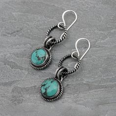 "One of a kind Turquoise Earrings.   Unique, one of a kind turquoise cabochons set in solid sterling silver.   Sterling silver French ear wires. Total length from the top of the ear wire to the bottom of the earring is 1 3/4 inches. Turquoise cabochons are  1/2\" across. One of a kind, ready to ship. You may also like: https://www.etsy.com/shop/KiraFerrer For more turquoise: https://www.etsy.com/shop/KiraFerrer?ref=hdr_shop_menu&search_query=turquoise" Southwestern Style Jewelry With Oxidized Finish, Artisan Turquoise Pierced Jewelry, Bohemian Style Cabochon Dangle Jewelry, Turquoise Cabochon Bohemian Jewelry, Turquoise Cabochon Dangle Jewelry, Southwestern Style Oxidized Round Jewelry, Southwestern Turquoise Jewelry With Ear Wire, Bohemian Oval Cabochon Earrings, Oxidized Turquoise Oval Jewelry