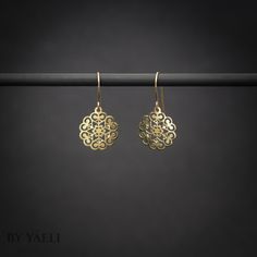 "Gold Lace Flower Shape Dangle Earrings, a symbol of refined femininity and intricate craftsmanship. These earrings boast a captivating design inspired by delicate lace and fashioned into a beautiful flower shape. The intricate lace-like detailing adds a vintage charm, making them an ideal accessory for both casual and formal occasions.  ★Comes in our signature gift box, ready for gift giving.  ★ Available in Gold [ gold-filled ear wires & gold plated brass & zircon stone ]  ★ Earring size (flower)0.50\"x0.40\" Thanks for shopping at ByYaeli♥  All images, texts & products are property of ByYaeli ©2020" Elegant Brass Flower Earrings Nickel Free, Elegant Pierced Flower Earrings, Elegant Gold Flower Earrings Nickel Free, Elegant Round Flower Pierced Earrings, Elegant Round Flower Earrings Pierced, Gold Flower Jewelry With Intricate Design, Gold Flower Earrings In 14k Round Shape, Gold Round Flower Earrings In 14k Gold, 14k Gold Round Flower Earrings