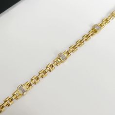 ✦ Adorn your wrist with elegance and sophistication with our 18K gold plated diamond chain bracelet. Crafted in a classic chain style, this bracelet exudes timeless charm and versatility. Featuring sparkling diamonds set in luxurious gold plating, it's the perfect accessory to elevate any outfit with a touch of glamour.----------- DETAILS ------------ Color: Gold - Size (Length): 18.8cm - Materials: Brass, 18K Gold Plated, Cubic Zirconia - SKU: QT2203 Formal Cubic Zirconia Chain Link Bracelets, Formal Cubic Zirconia Diamond Chain Link Bracelet, Luxury Diamond Bracelets With Gold Chain, Formal Cubic Zirconia Diamond Bracelet Chain Link, Elegant Chain Link Tennis Bracelet For Formal Occasions, Formal Chain Bracelet With Diamond Accents And Rectangular Links, Classic Gold Chain Bracelet With Diamond Accents, Elegant Gold Bracelet With Box Chain For Anniversary, Elegant Gold Diamond Bracelet With Box Chain