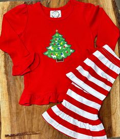 "Hi and Welcome to my store.  Thank you for stopping by to check out our cute little frill Christmas outfit.  I can add her name under the tree. Just add that at checkout in the comments to me.  The pants are stretchy so they fit well.  These shirts and pants are super soft and comfy.  Please let me know if you don't see your size. *Please note that I personalize the dresses, another company makes them.  💕 Our current production time is 5-7 days plus shipping time. If I need to order your item it will add 5 days to the process.    If you are needing a rush order please add the \"Rush My Order\" listing from my shop.  (please message me before you purchase this to make sure I have your item in stock)   https://www.etsy.com/listing/545381716/rush-my-order-1-2-day-processing-time? Thank you Cute Festive Winter Sets, Christmas Outfit For Kids Girl, Festive Winter Cotton Sets, Festive Cotton Sets For Winter, Cotton Festive Winter Sets, Festive Long Sleeve Winter Sets, Holiday Long Sleeve Cotton Sets, Cotton Long Sleeve Sets For Holiday, Holiday Long Sleeve Sets For Fall