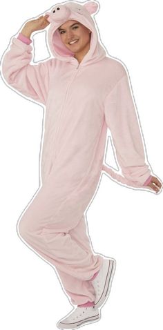 a person in a pink animal onesuit posing for the camera with one hand on his head