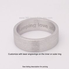 White gold plated men's wide ring crafted from sterling silver and plated in white gold. This silver wedding band has a unique brushed matte finish giving it a masculine design element. Please use this link if you are interested in customizing the ring with engravings or gemstone options: https://www.etsy.com/listing/69521785 SPECIFICATION Approximate Ring Width: 5-6 mm Base metal: 925 sterling silver Plating: White gold rhodium. Brushed matte finish. We plate a thick layer but plated surface wi Modern Thick Band Promise Ring, Formal Stainless Steel Round Band Jewelry, Modern Stainless Steel Jewelry For Anniversary, Modern Engraved Thick Band Ring For Wedding, Modern Engraved Ring With Thick Band For Wedding, Modern Engraved Thick Band Wedding Ring, Modern Wide Band Anniversary Rings, Modern Engraved Wedding Ring With Thick Band, Minimalist Engraved Wedding Ring With Wide Band