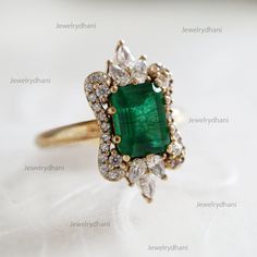 Solid 14K Yellow Gold Emerald Engagement Ring Pave Diamond Emerald Women's Ring// Mother's Day Gift Ring//Emerald Wedding Certified Jewelry >> About this product:- * SKU Code: JD-0055 * Handmade/ Handcrafted Fine Jewelry * Metal: 14K Solid Yellow Gold (with Stamped) * Metal Purity: 14K * Custom Metal Purity: 14K/ 18K * Diamond Weight: 1 Ct. * Emerald Weight: 2 Ct. * Diamond Color: G-H * Diamond Clarity: S2-SI1 * Diamonds Cut: Brilliant Cut (Excellent Cut) >> Sizing & Measurements:- * Ring Size:- Luxury Classic Teardrop Emerald Ring, Emerald Diamond Ring, Emerald Engagement, Green Diamond, Emerald Engagement Ring, Pear Shaped Diamond, Art Deco Ring, Green Emerald, Emerald Diamond