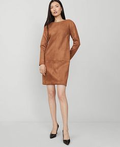 Elevate your wardrobe with the Ann Taylor Faux Suede Shift Dress, a piece that combines sophistication with comfort. This dress is perfect for any occasion, from office hours to evening outings.

- Size: 10 (Regular fit)
- Color: Sahara
- Material: Shell - 96% Polyester, 4% Spandex; Lining - 100% Polyester
- Gender: Female
- Features: Crew neck, bracelet sleeves, hidden back zipper with hook-and-eye closure, lined body
- Length: Hits above the knee
- Care Instructions: Machine washable

Crafted Suede Sheath Dress, Fall Brown Shift Dress, Cotton Shift Mini Dress, Knee-length, Brown Knee-length Stretch Mini Dress, Knee Care, V-neck Shift Dress With Pockets, Neck Bracelet, Ann Taylor Petite, Female Features